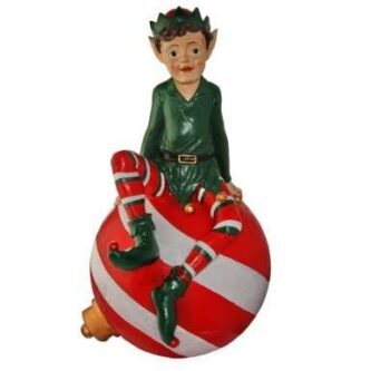 Outdoor Santa's Elf Sitting On A Christmas Ornament