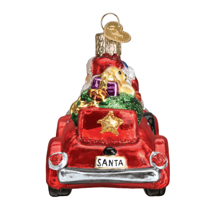 Old World Christmas Blown Glass Santa in Antique Car Ornament